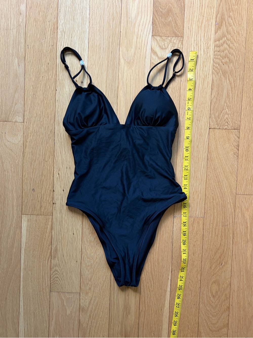 H&M black one piece swimsuit with pearl accent and open back